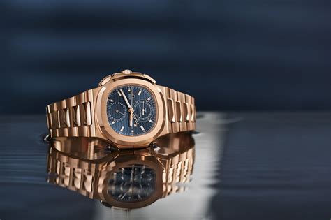 patek philippe gold blue face|Patek Philippe nautilus cost.